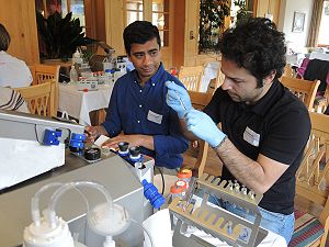 Sudarshan and Amin in the O2k-Fluorescence experiment